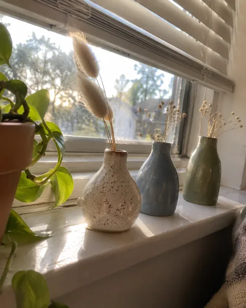 Handmade clay bud vase